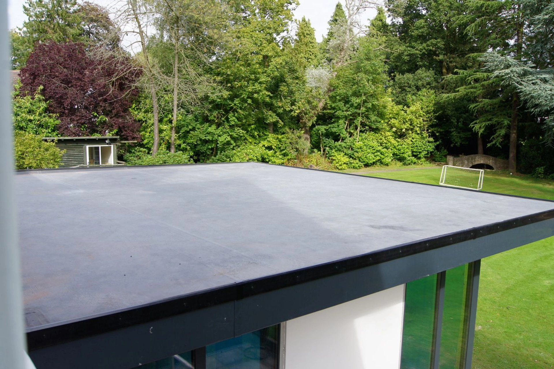 EPDM flat roofing being fitted on a domestic property